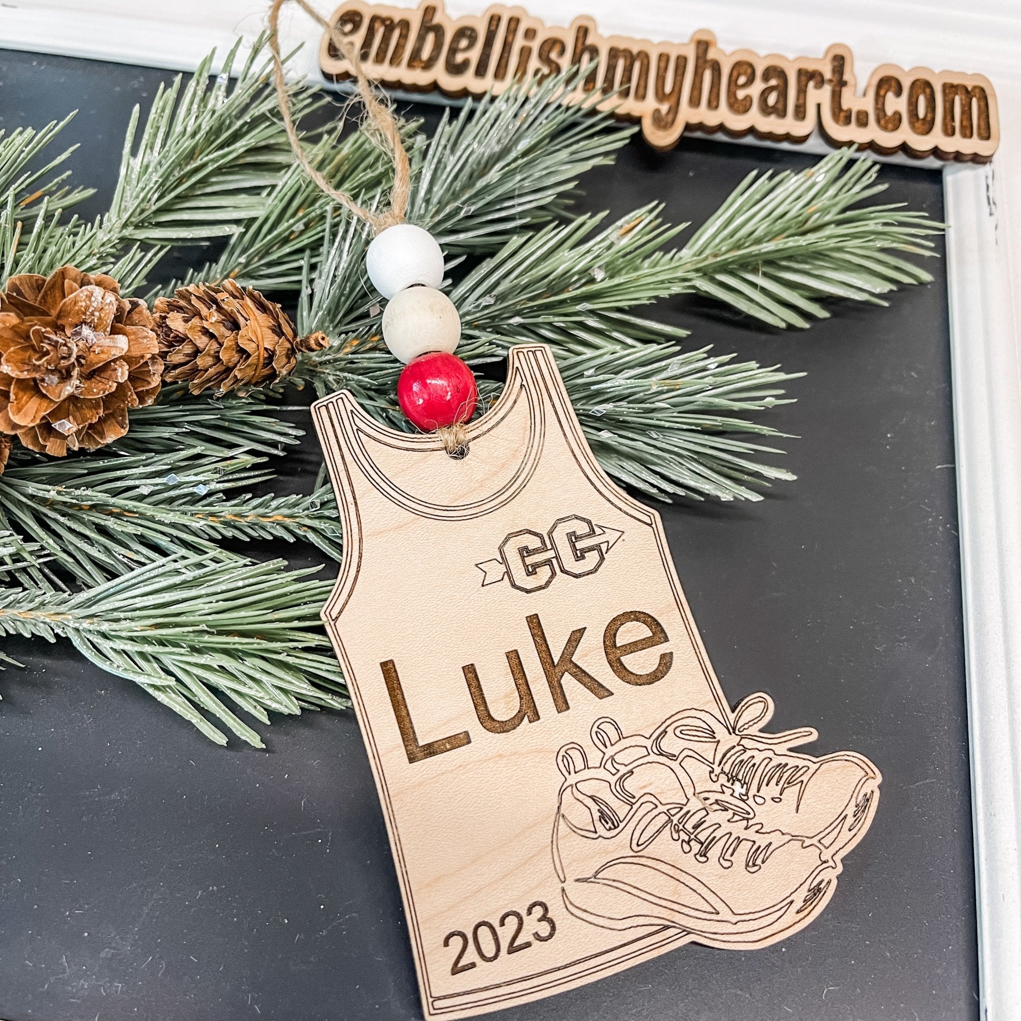 http://embellishmyheart.com/cdn/shop/products/cross-country-personalized-christmas-ornament-716863.jpg?v=1699900496